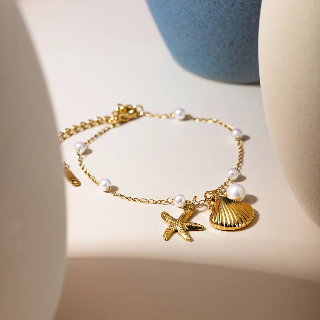 Fashion Jewelry 18K Gold Stainless Steel Pearl Chain with Summer Shell & Starfish Pendant Bracelet